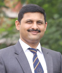 Shri M. Anisha Kalkoor, IFS